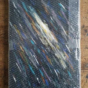 Careful wrapping of an original artwork